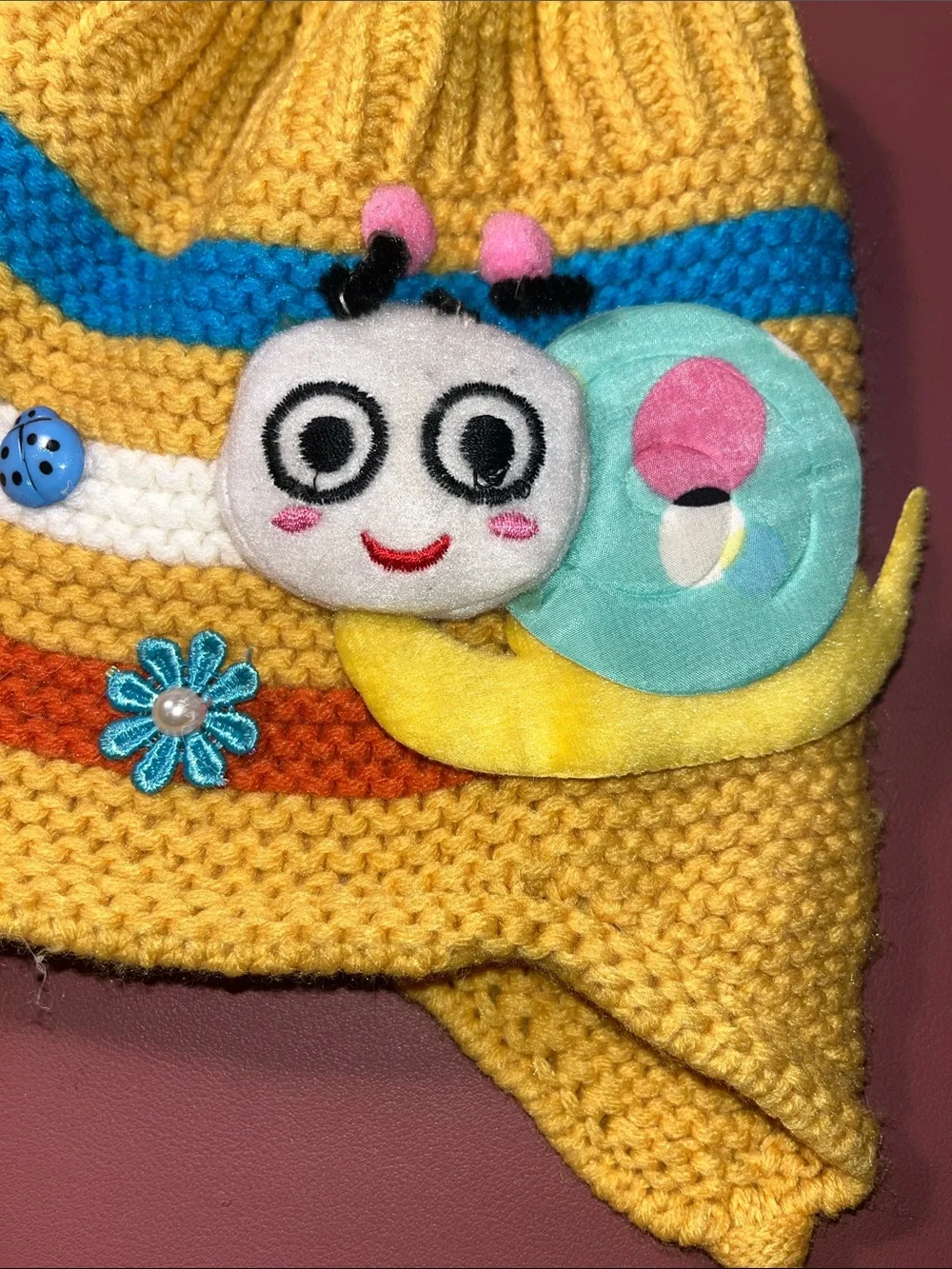 Kids Plush Panda Earflap Hat - White and Pink and a yellow hat with a snail